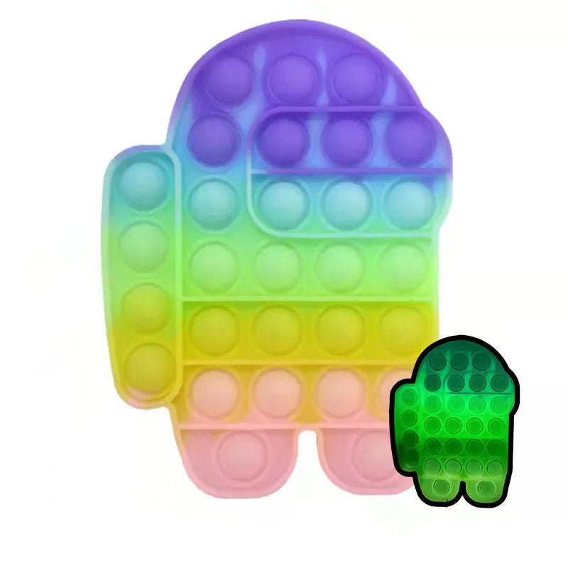 The FidgetFuns Rainbow Pop Fidget Stress Toy is shaped like a character with a purple-to-pink gradient for sensory satisfaction, while a smaller glow-in-the-dark green version offers stress relief and delight with every pop.